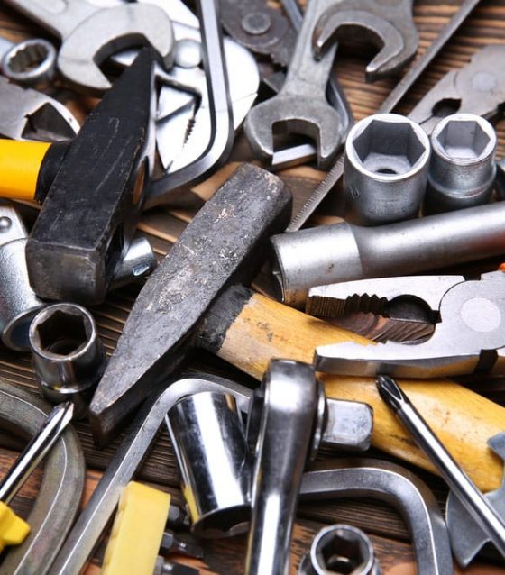 Hand Tools On A Wooden Table